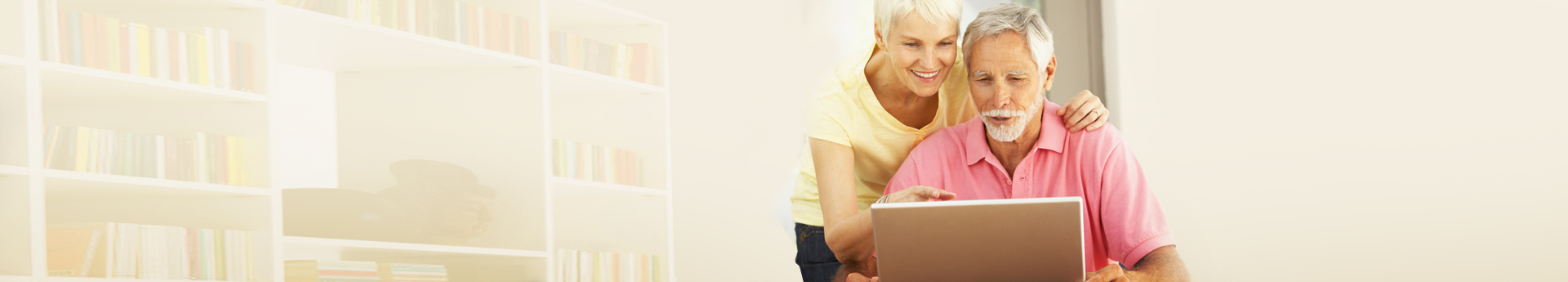 Senior-Couple-Using-Laptop-home